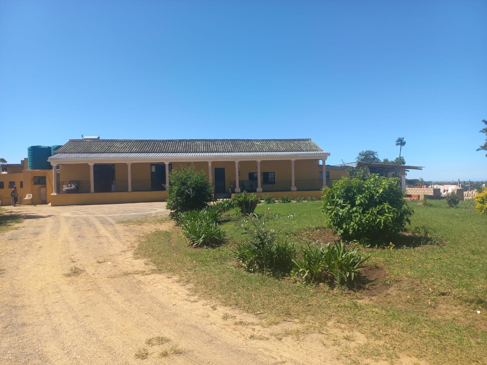 The Word of God Care Centre building at Betania Farm Mission Station, Port Shepstone, under a blue sky